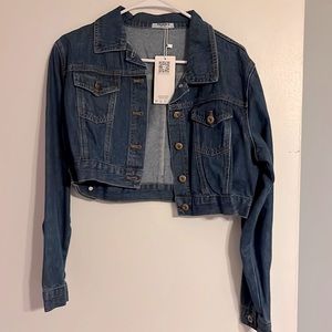 Never worn denim jacket.